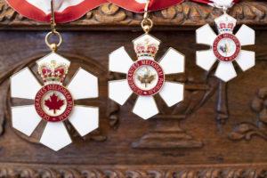 Order-of-Canada-wood-background-1